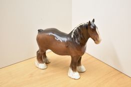A Beswick Pottery Shire Mare study number H818, designed by Arthur Gredington in brown gloss.