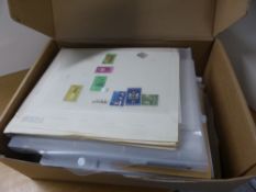 WORLD WIDE COLLECTION ON LEAVES, PACKETS AND FOLDERS Box with hundreds of leaves with part