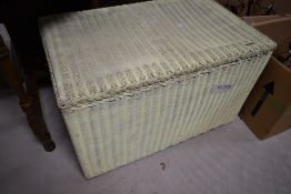 A vintage Lloyd Loom bedding box