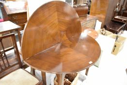 A mid 20th Century stained frame fold over table
