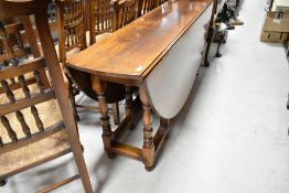 A very nice reproduction oak turned gate leg table in the period style, Titchmarsh and Goodwin or