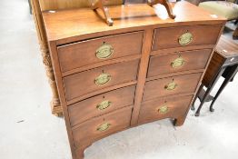 A Regency style concave chest of eight drawers, width approx. 85cm