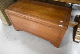 A traditional camphor wood blanket box, approx dimensions 90 x 45 x 48cm