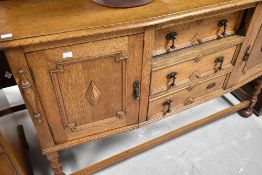 An early 20th Century golden oak mirror back sideboard, width approx. 137cm