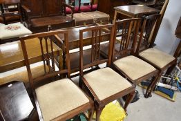 A set of four Edwardian mahogany dining chairs