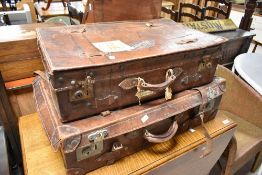 Two vintage leather travel cases
