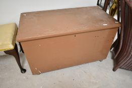 A traditional painted pine bedding chest and contents