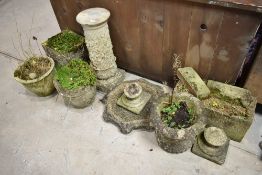 A selection of assorted concrete garden planters , bird bath etc