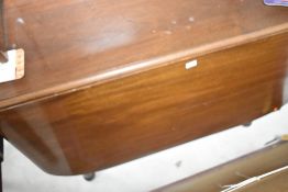 A Victorian mahogany drop leaf dining table on turned legs, closed size approx. 103 x 71cm