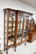 An Edwardian mahogany breakfront bookcase/display cabinet, width approx. 163cm