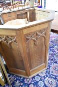 A traditional golden oak church pulpit/lecturn, with brass plaque in mrmory of Rev William Goad