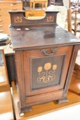An Art Nouveau mahogany coal purdonium