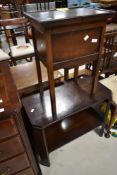 A vintage oak sewing box and stained frame occasional table