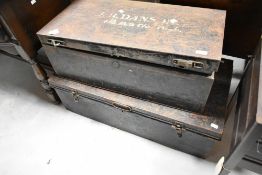 Two vintage metal deed or travel trunks