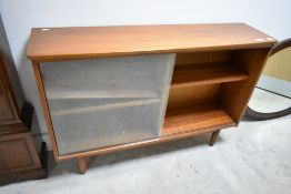 A vintage teak low bookcase, width approx. 110cm