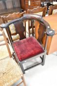 A 19th Century corner chair having later upholstered drop in dralon seat