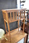 A bijouterie style occasional table having mirrored top