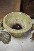 A large concrete garden urn