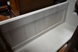 A traditional church pew, with book rail to back, painted in light grey , width approx. 195cm
