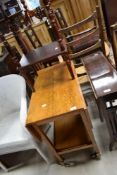 An early 20th Century golden oak tea trolley and a reproduction etage