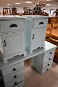 A selection of painted bedroom furniture comprising dressing table/desk and pair of bedside