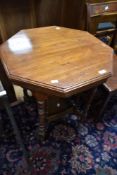A Victorian mahogany octagonal occasional table having galleried under tier, width approx 61cm