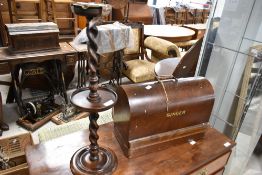 A vintage oak smokers stand and Singer sewing machine