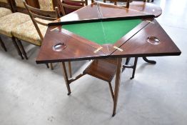 An Edwardian mahogany envelope card table having line inlay decoration, width approx. 57cm