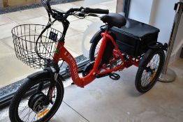 A Jorvik Elite E electric trike, in as new condition, inlcudes two batteries, charger, accesories