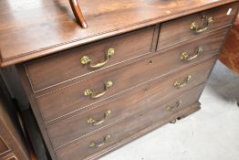 A 19th Century late Georgian style mahogany chest of two over three drawers having brass drop