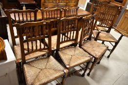 A very nice set of eight (six plus two) reproduction oak spindle back chairs having rush seats ,