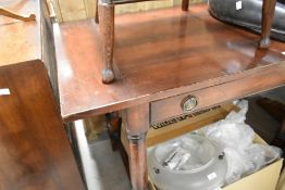 A reproduction hardwood side table