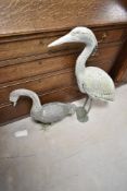 Two garden ornaments, being plastic heron and cast alloy swan or goose