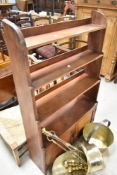 A 19t Century Arts & Crafts mahogan waterfall bookshelf with double cupboard under, approx 76 x