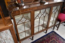 An early 20th Century mahogany triple display cabinet, width approx. 138cm