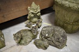 A small selection of concrete garden ornaments