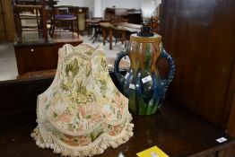 A traditional studio potter style slip glazed table lamp