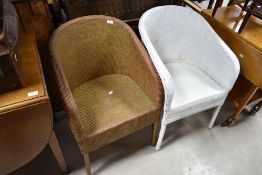 Two woven fibre tub chairs