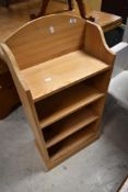 A small pine bookshelf, approx dimensions W46 D23 H95cm