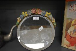 A vintage barbola style dresser mirror with fold out stand to rear.