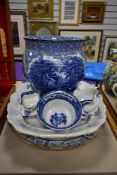 A selection of blue and white ware items including a large planter and two large serving platters