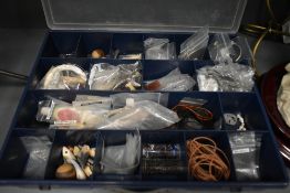 A box of assorted jewellery making items including glass, wooden and stone beads, wires and