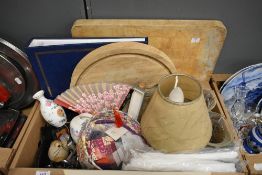 A miscellaneous selection of items including two substantial vintage wooden chopping boards, a