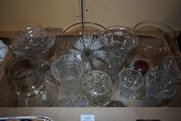 A collection of assorted glass ware including a large crocus form vase, cake stand, vases and rose