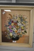 A late 20th century hand-crafted mixed media pressed still life scene using fabric scraps and