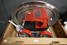 Nine large stainless steel serving trays, a large vintage model car and a Spanish display spoon.