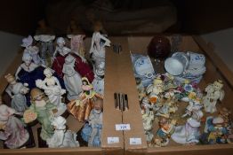 Two cartons of assorted figurines, a pretty Victoria part tea service having blue floral