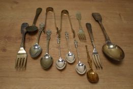 A small selection of flatware including three apostle spoons and sugar nips etc.