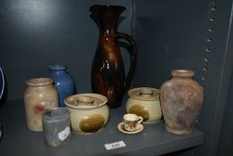 A 20th Century studio pottery vase, by Ewenny Pottery and decorated in an iridescent drip glaze,