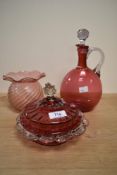 A late 19th century cranberry glass decanter, h26cm, sold alongside a cranberry powder bowl,